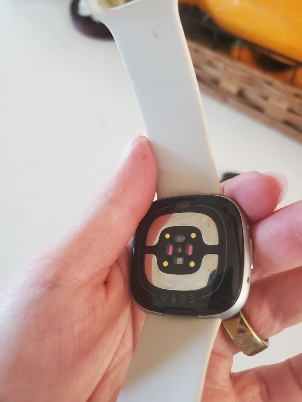 Fitbit Sense 2 smartwatch With Charger And Gold Screen Protector.